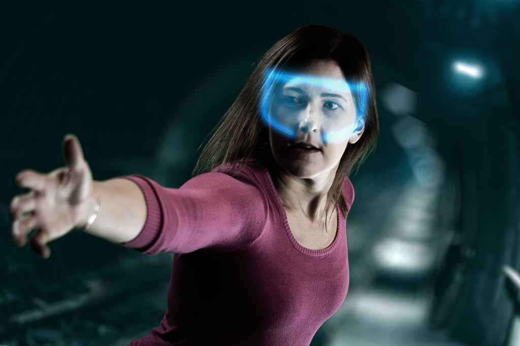 woman in VR reaching for something